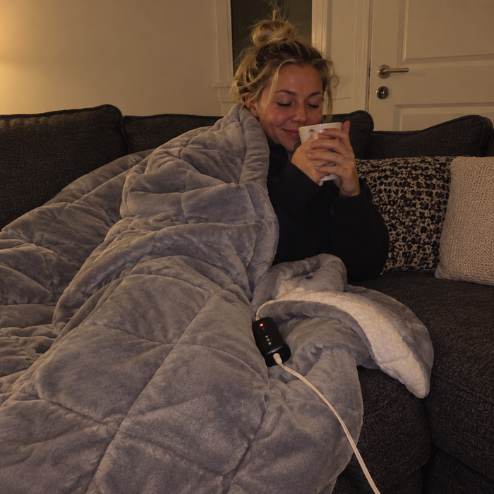 Te, soffa och en elfilt