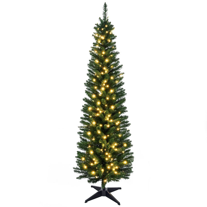 Smal julgran med varmvit belysning