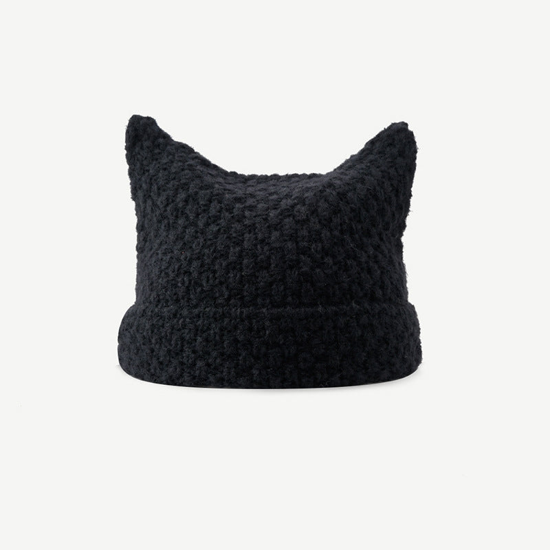 Randig stickad mössa med kattöron och stjärna