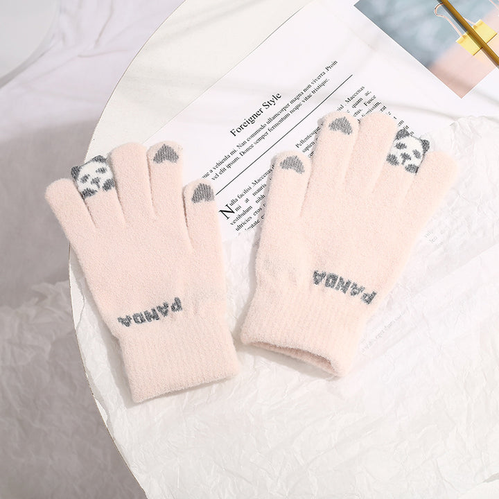 Stickade rosa handskar med pandafigur på fingret