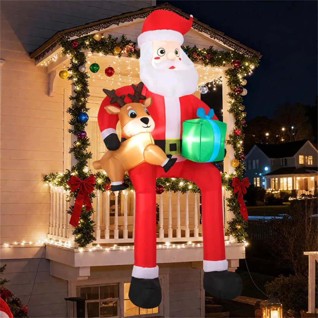 Stor uppblåsbar tomte med ren och paket