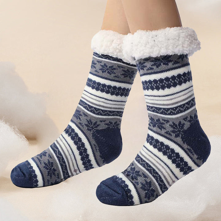 Extra tjocka sockor med snöflingor och halkskydd