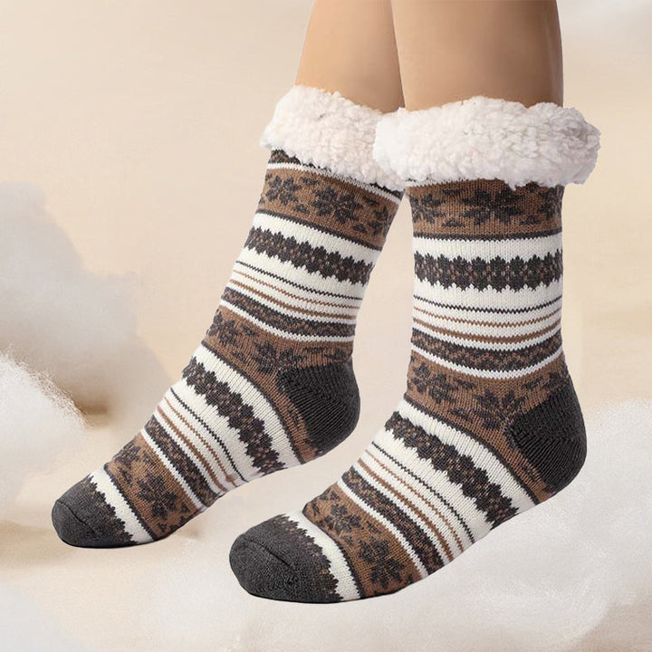Extra tjocka sockor med snöflingor och halkskydd