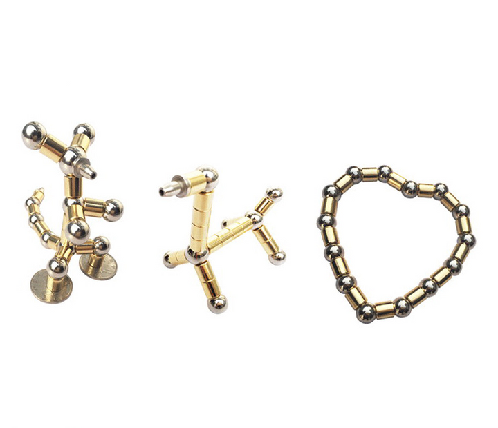 Magnetisk penna i silver med kulor
