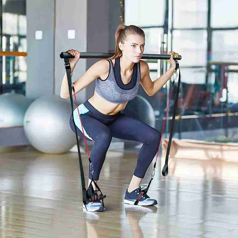Pilatesstång med motståndsband