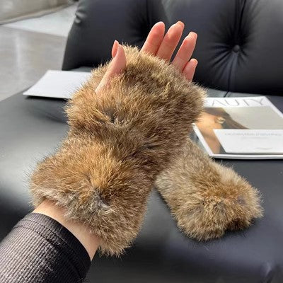 Fluffiga fingerlösa muddar i kaninpäls