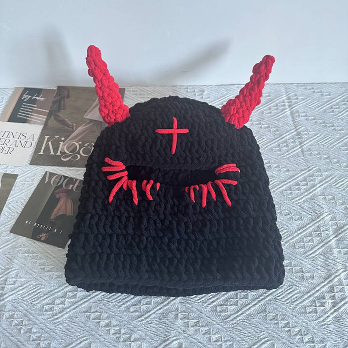 Myslunda Handvirkad bucket hat i chunky garn med små horn