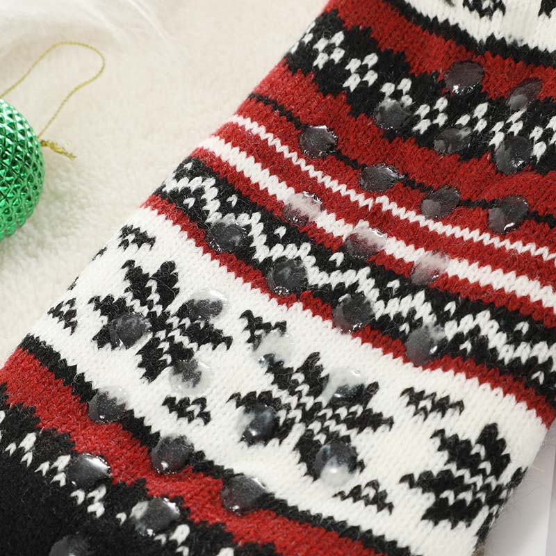 Extra tjocka sockor med snöflingor och halkskydd