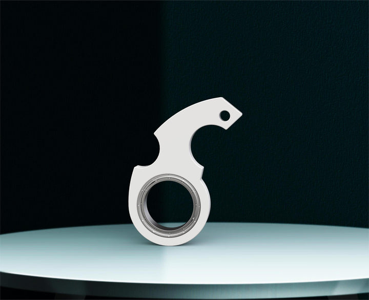 Röd fidget spinner på nyckelring