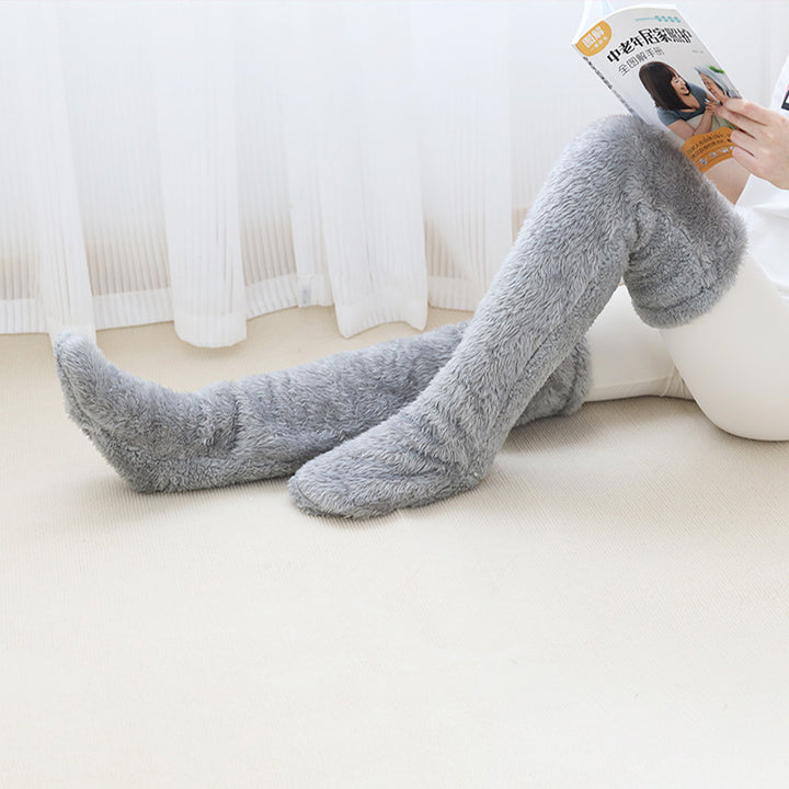 Lurviga overknee-sockor i ljuslila