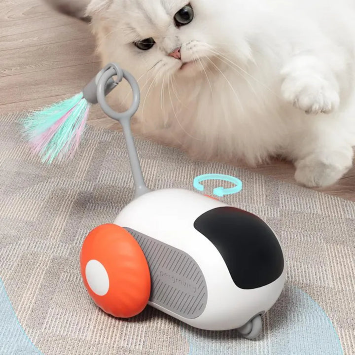 Orange leksaksbil med fjäder för katt