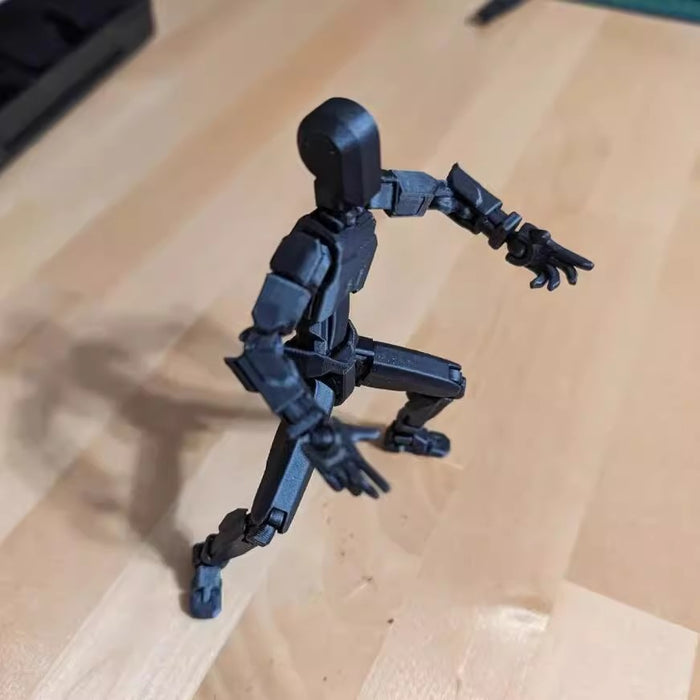 Myslunda 3D-printad robotfigur med rörliga leder