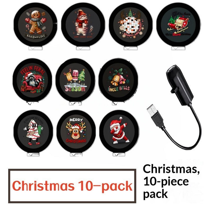 Liten USB-projektor som visar julmotiv på vägg