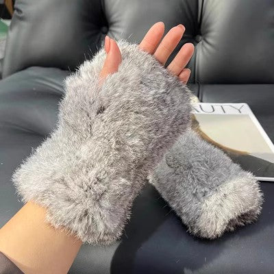 Fluffiga fingerlösa muddar i kaninpäls