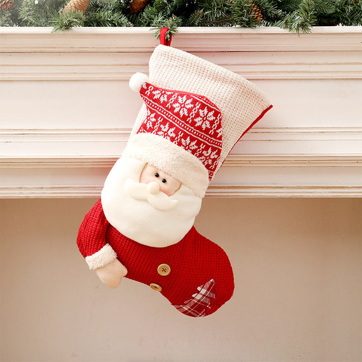Stickad julstrumpa med tomte eller snögubbe