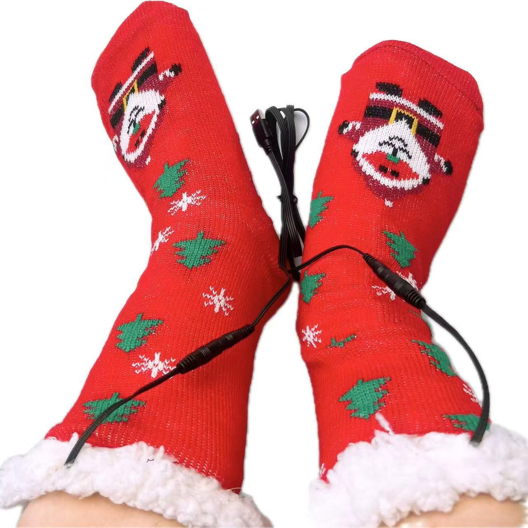 Stickade julsockor med renmönster och USB-kabel