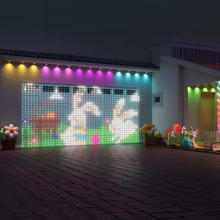 LED-ljusgardin som visar julmotiv i fönster