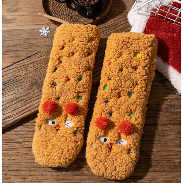 Fluffiga sockor med broderat ansikte i gult
