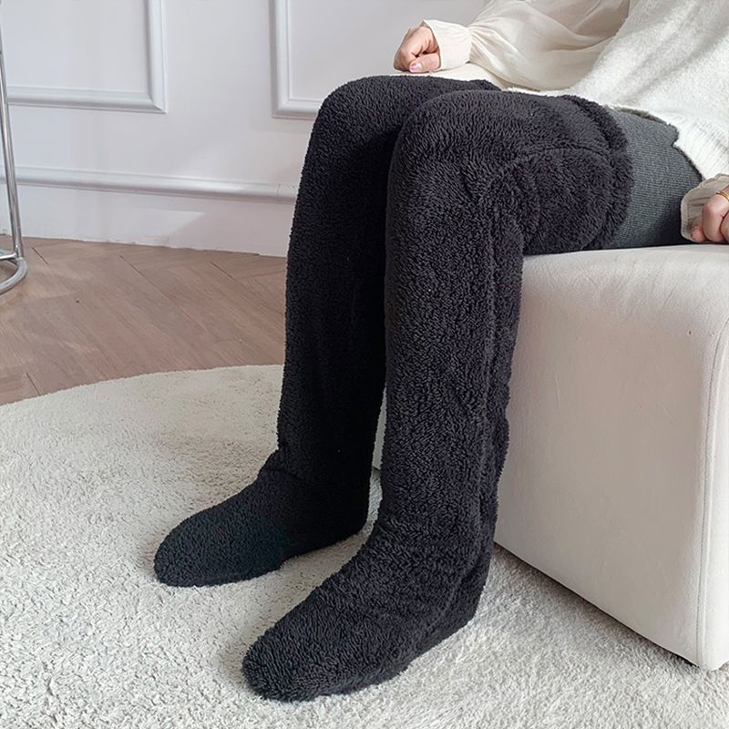 Lurviga overknee-sockor i ljuslila