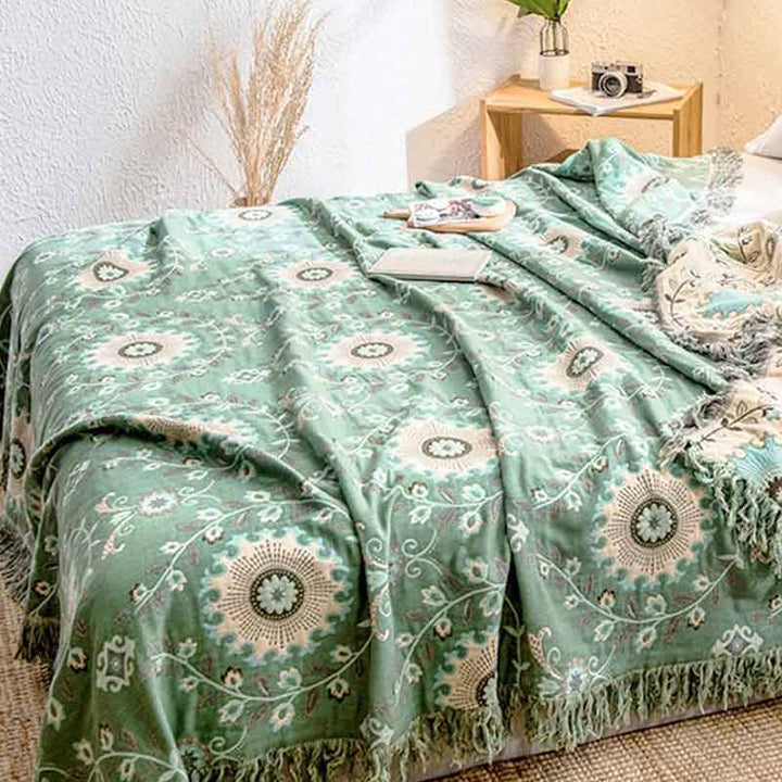 Vändbart soffskydd i bomull som även fungerar som överkast