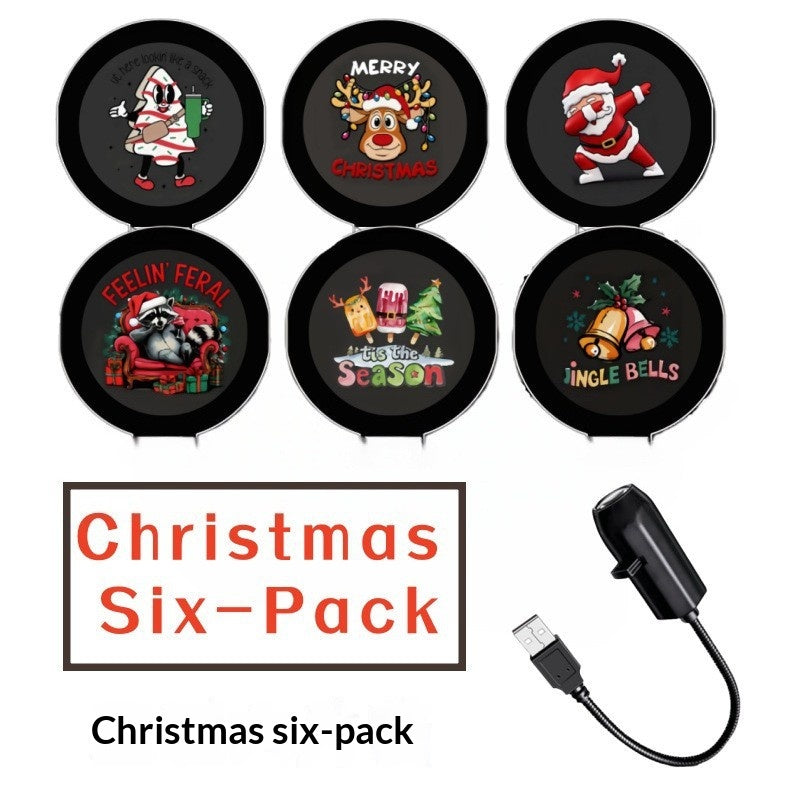 Liten USB-projektor som visar julmotiv på vägg
