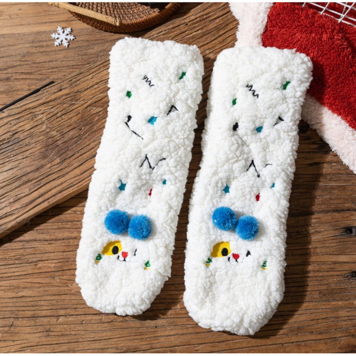 Fluffiga sockor med broderat ansikte i gult