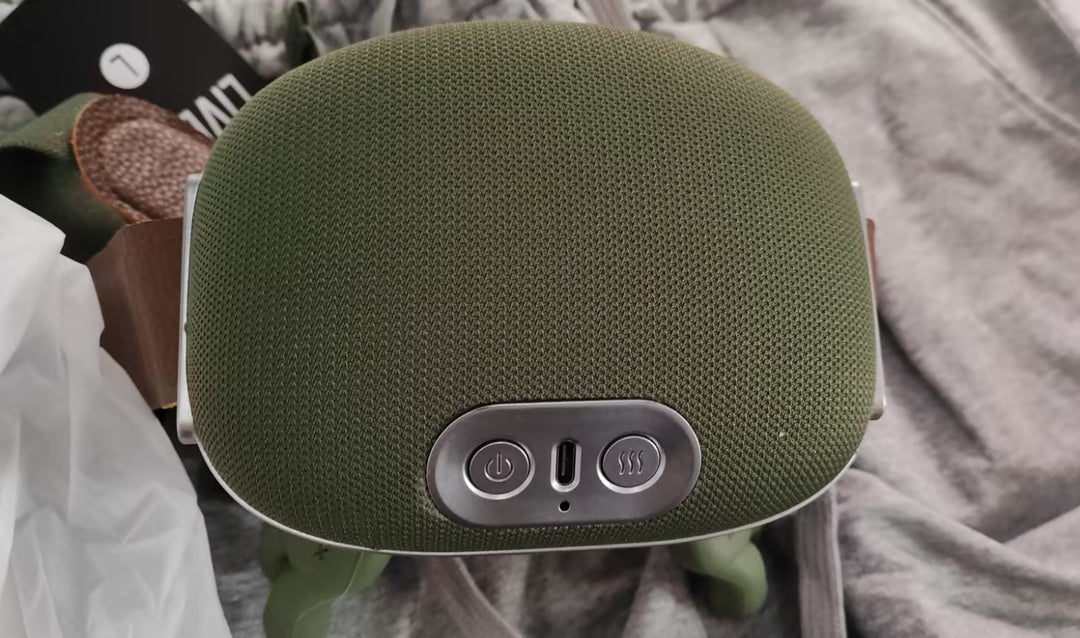 Grön sladdlös nackmassager med remmar