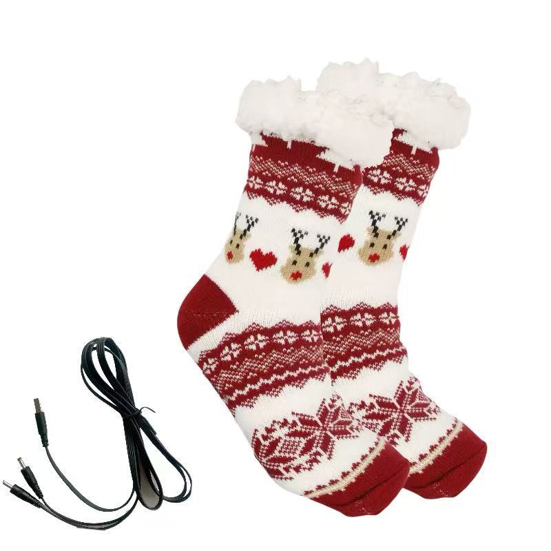 Stickade julsockor med renmönster och USB-kabel