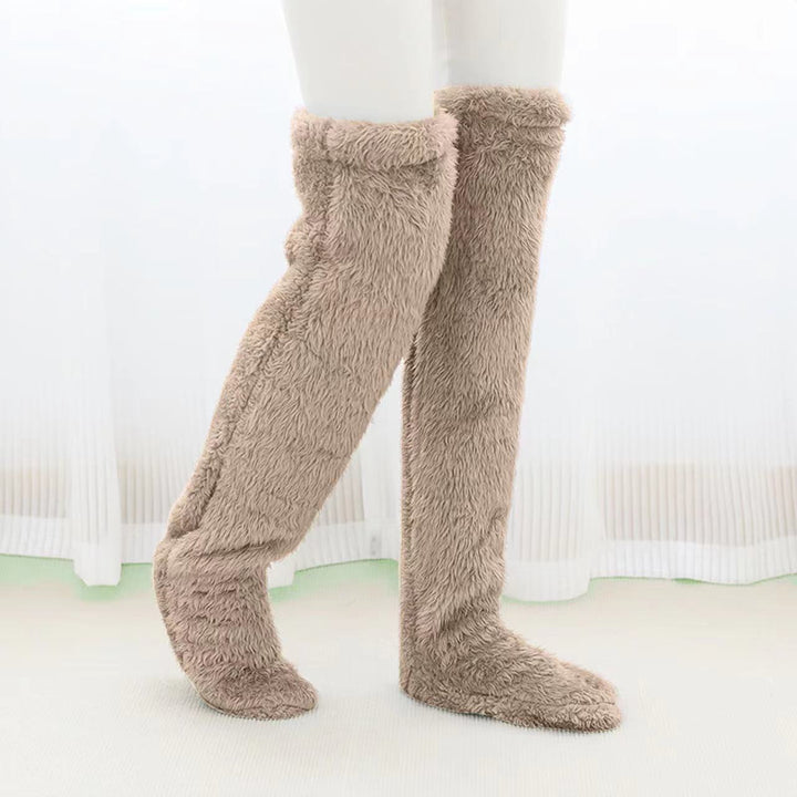 Lurviga overknee-sockor i ljuslila