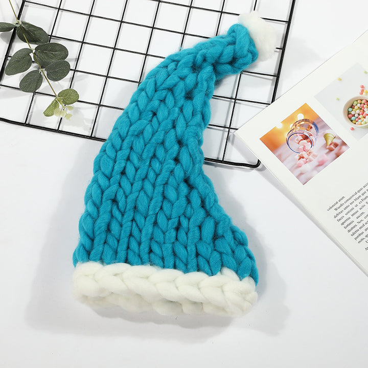 Grovstickad röd tomteluva med pompom