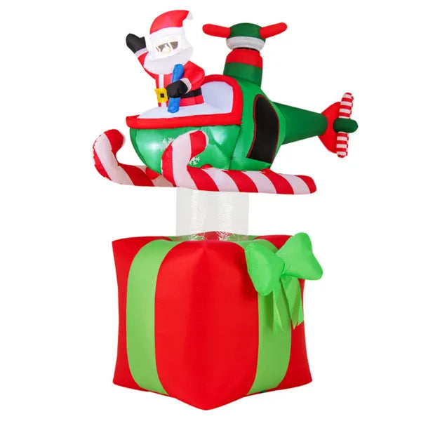 Uppblåsbar tomte i helikopter på paket