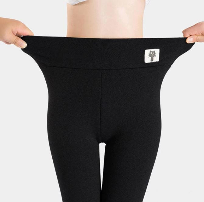 Tjocka fleecefodrade termoleggings för dam