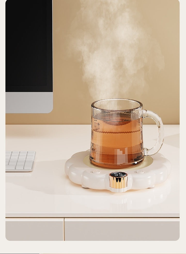 Blomformad muggvärmare med kaffemugg