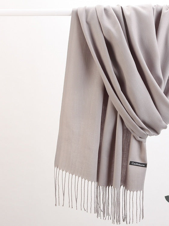 Enfärgad beige halsduk med fransar