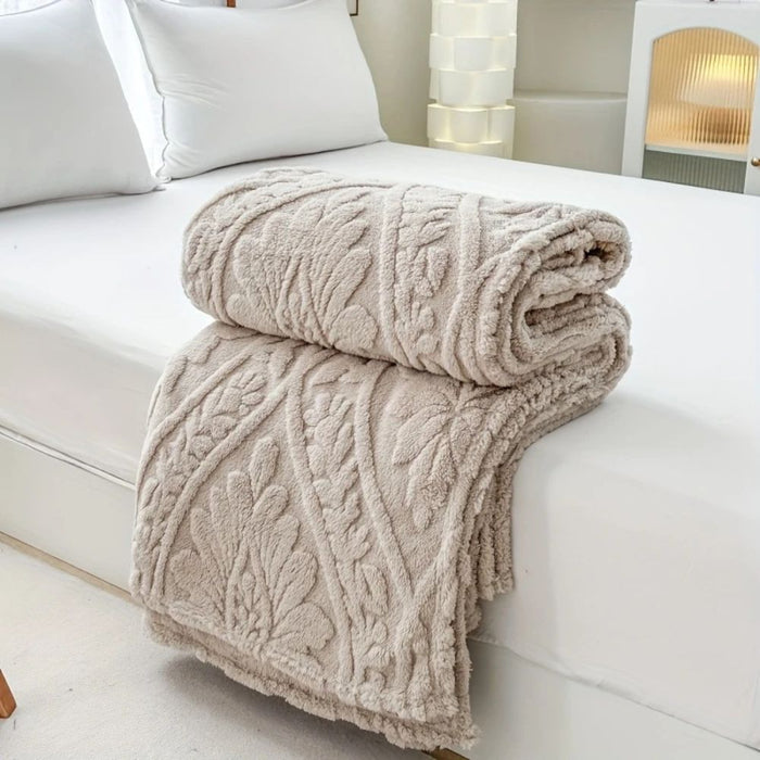 Myslunda™ Fleecepläd i jacquard med geometrisk struktur i fyra storlekar