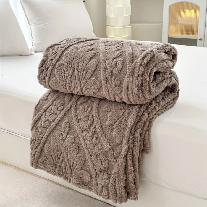 Myslunda™ Fleecepläd i jacquard med geometrisk struktur i fyra storlekar