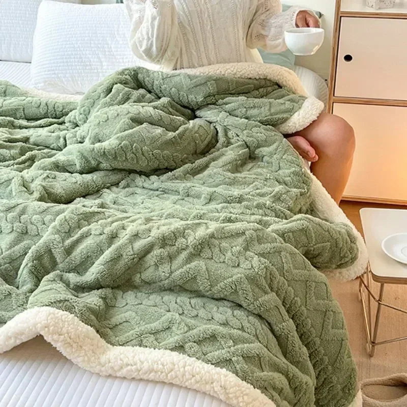 Vändbar sherpafilt i fleece som värmer utan att tynga