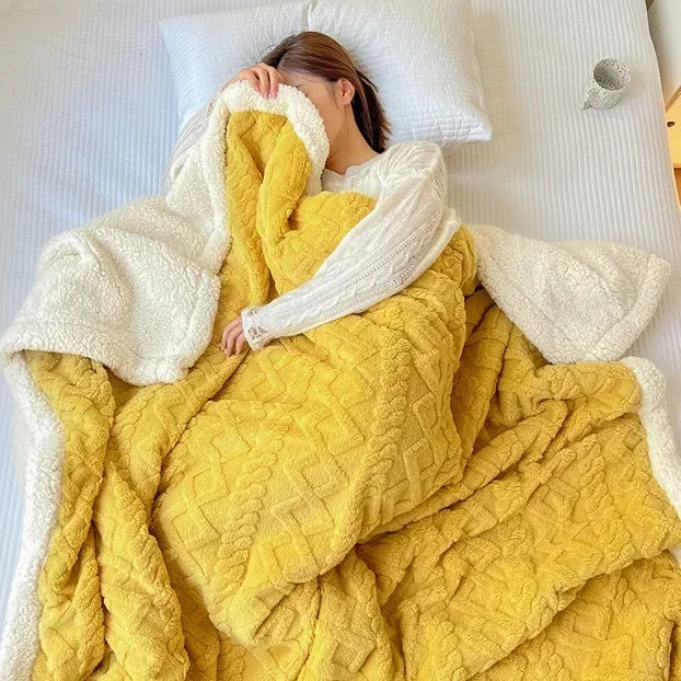 Vändbar sherpafilt i fleece som värmer utan att tynga