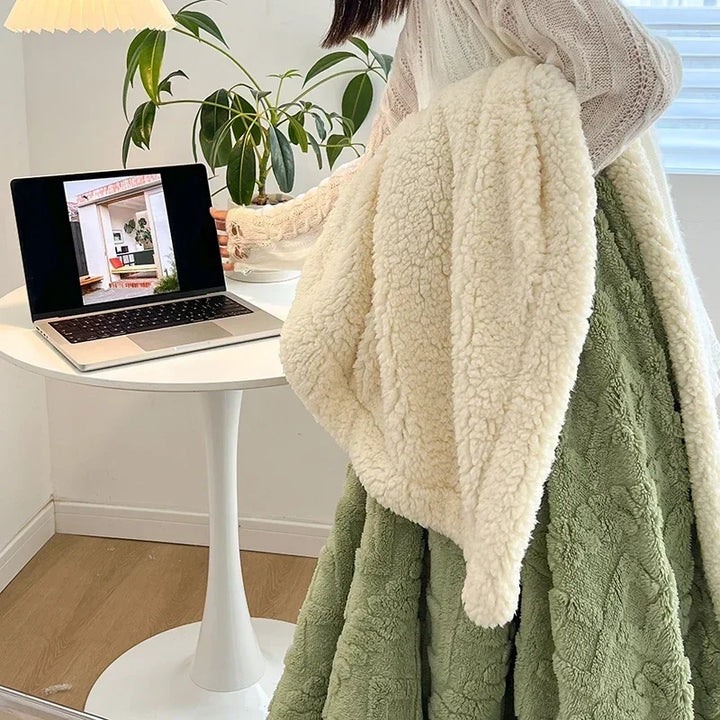 Vändbar sherpafilt i fleece som värmer utan att tynga
