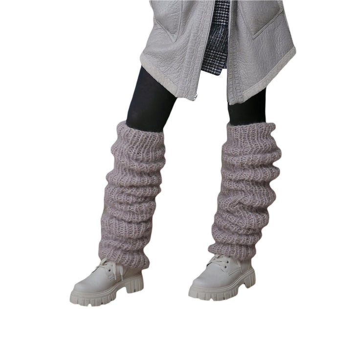 Grovstickade benvärmare i rosa över boots