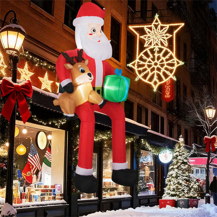 Stor uppblåsbar tomte med ren och paket