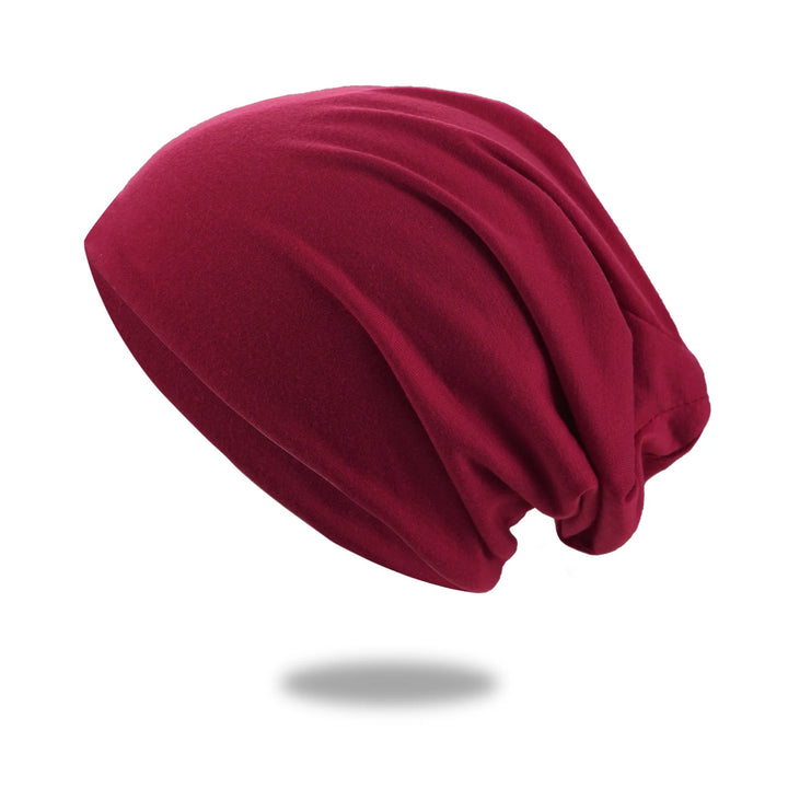Slouch beanie i andningsbar stickning med stretch