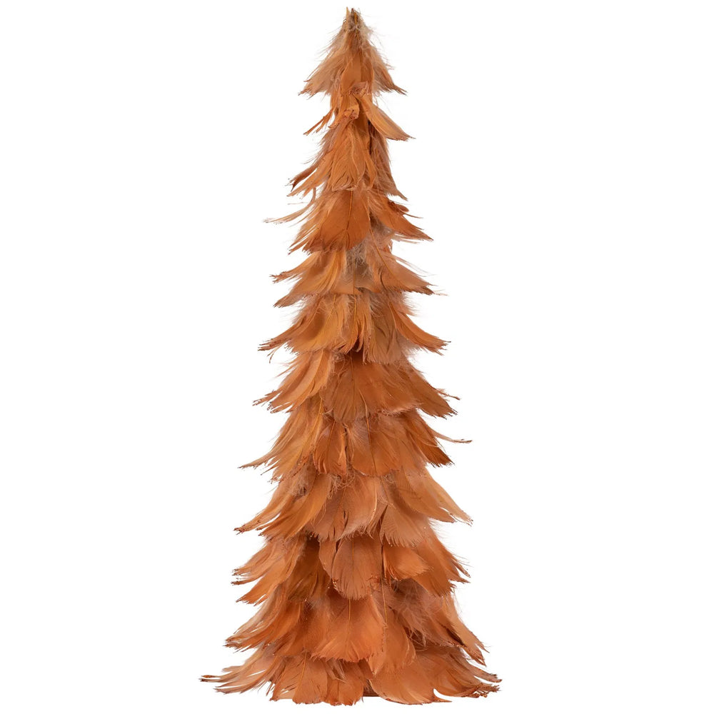 Rostorange fjädergran med glitter på bord