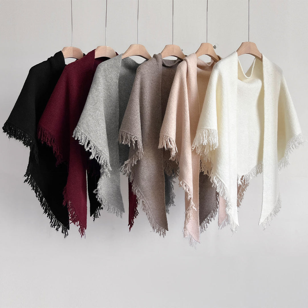 Rosabeige stickad halsduk med fransar