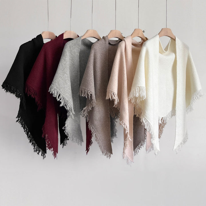 Rosabeige stickad halsduk med fransar