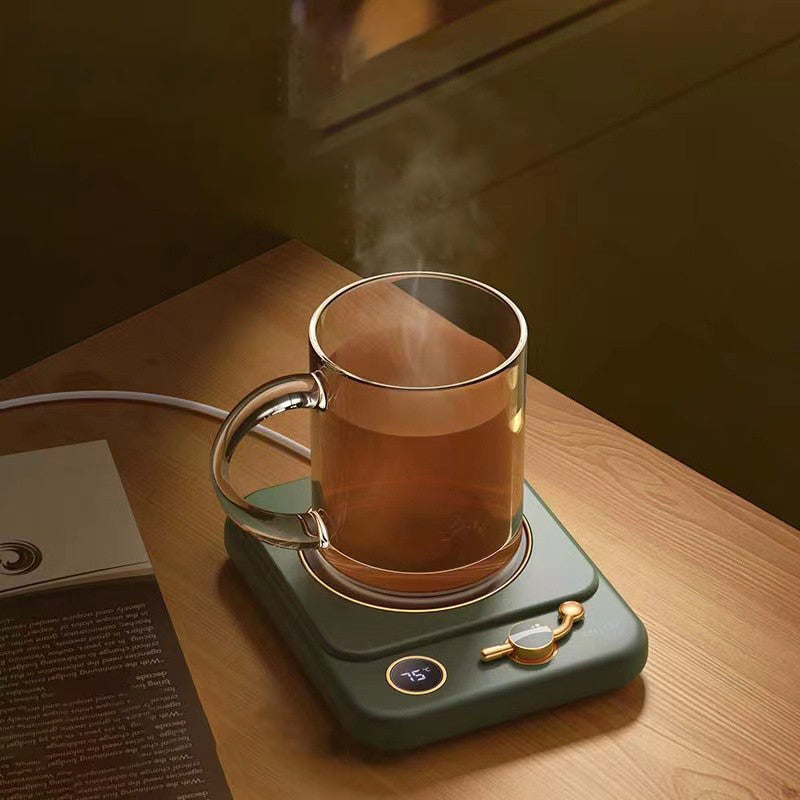 Grön retro koppvärmare med kaffemugg
