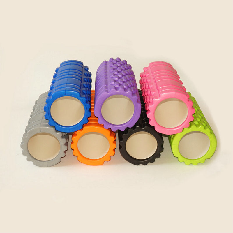 Lila foam roller med rutmönster