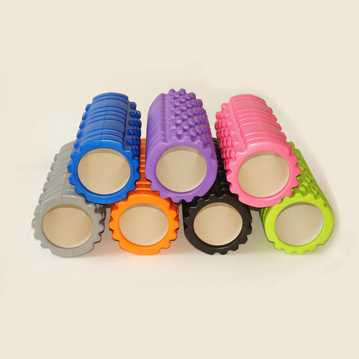 Lila foam roller med rutmönster