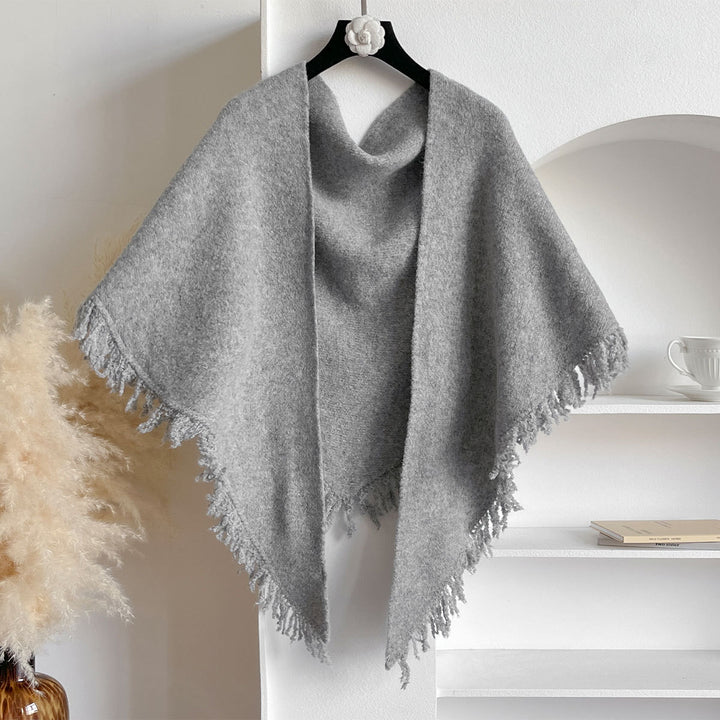 Rosabeige stickad halsduk med fransar