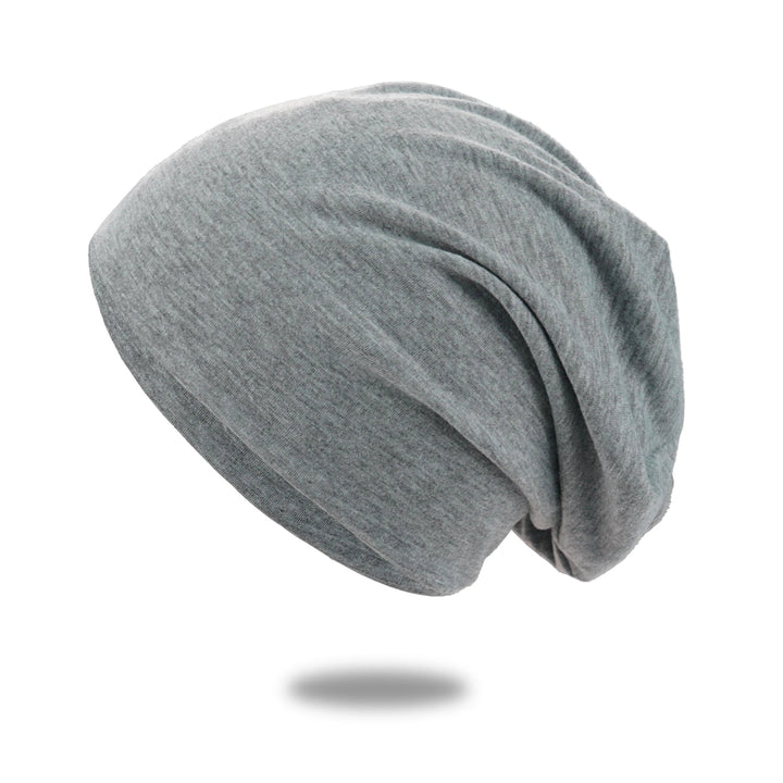 Slouch beanie i andningsbar stickning med stretch